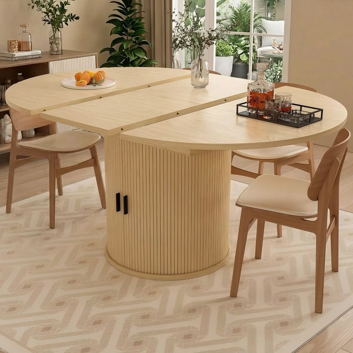 Extendable Kitchen Table Designs: 16 Ideas with Photos 12 Light wood oval dining table with a fluted base and matching chairs.