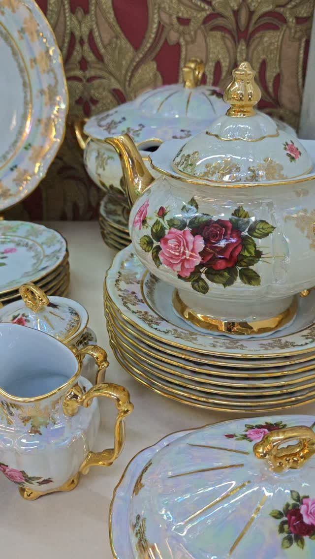Fancy Dinnerware Set Ideas for 2026 Tables (28 Styles) 25 White porcelain dinnerware set with gold trim and red rose floral patterns.