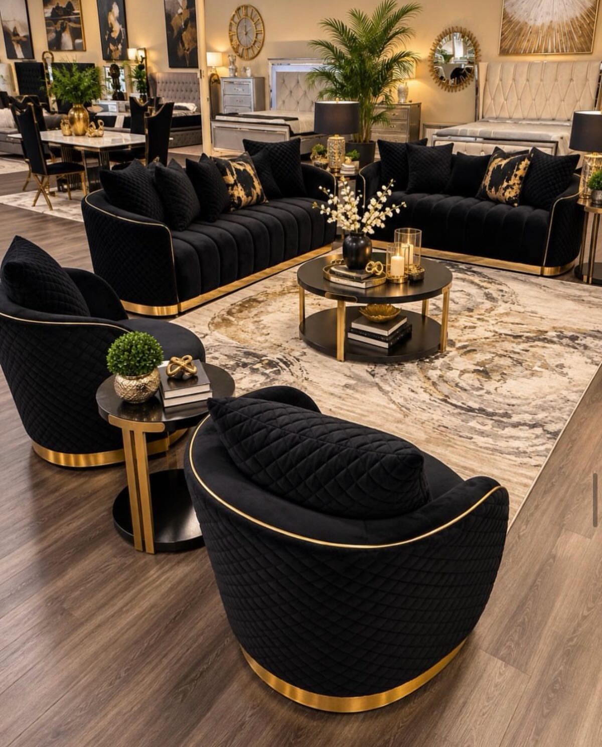 9 Gold Accent Living Room Ideas for Every Style 9 Black quilted sofas and armchairs with gold accents in a luxury living room