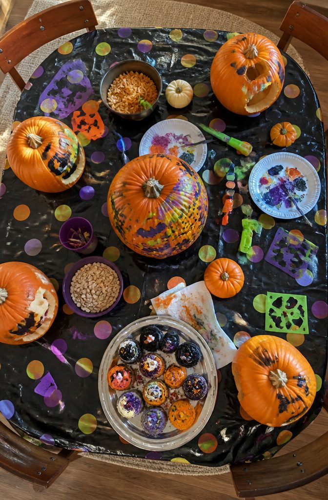 Guests carving and painting pumpkins at a Halloween-themed decoration party.