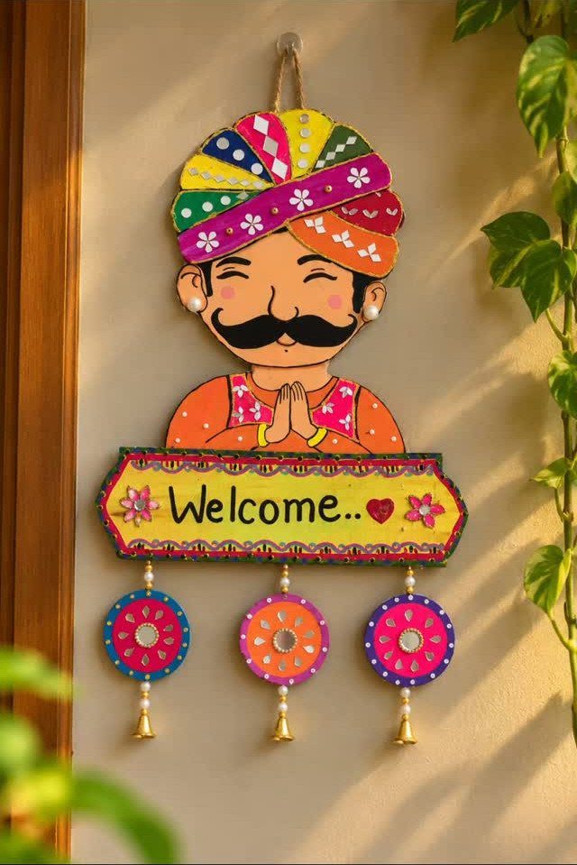Indian Room Decor: 37 Ideas From Textiles to Wall Hangings 22 Colorful handmade wall hanging of a man in a turban with a welcome sign.