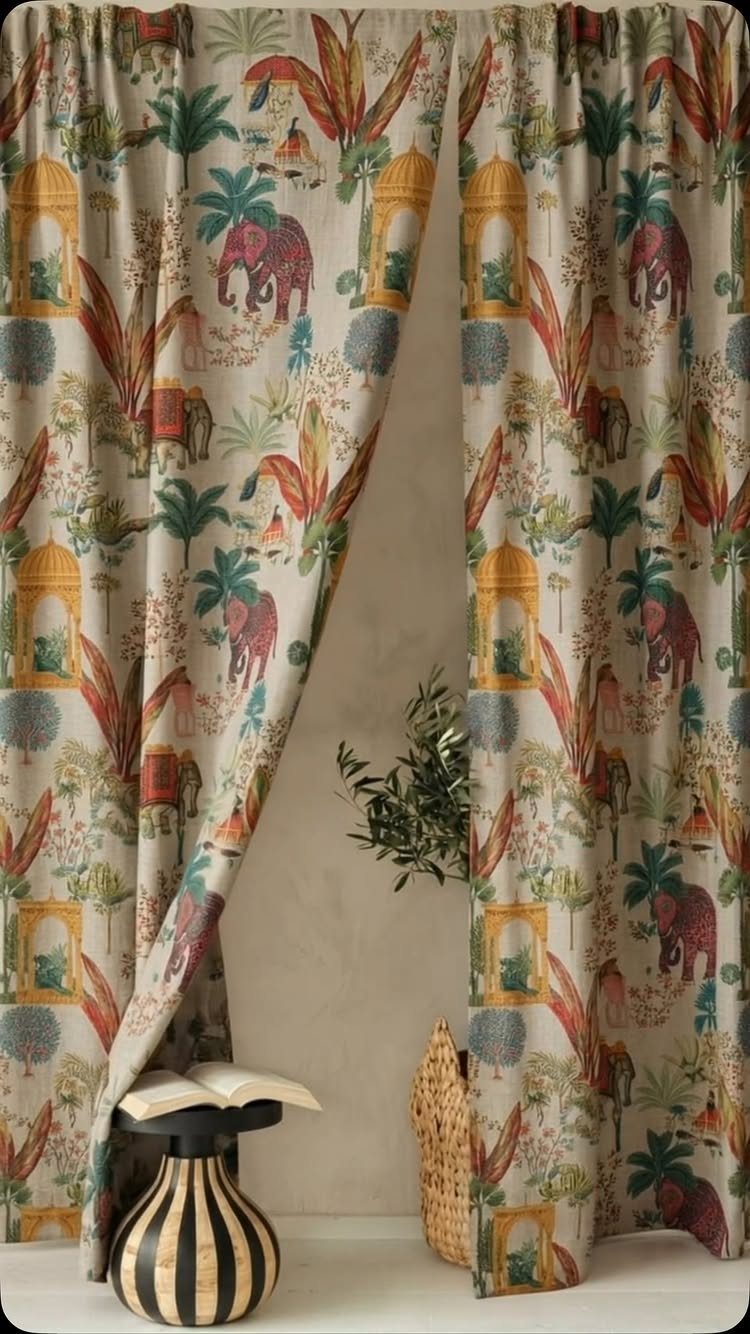 Indian Room Decor: 37 Ideas From Textiles to Wall Hangings 20 Patterned curtains with colorful Indian elephants and architectural motifs in a room.
