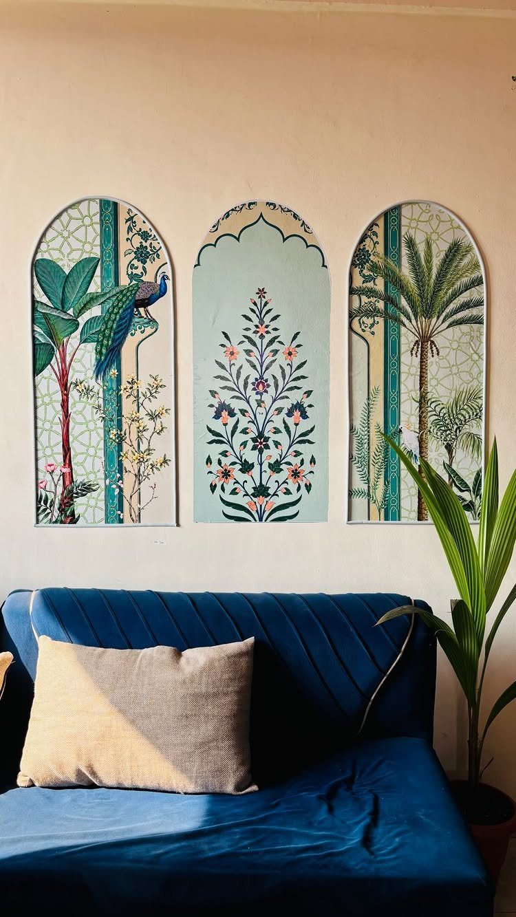 Indian Room Decor: 37 Ideas From Textiles to Wall Hangings 16 Three arched Indian wall panels with peacock and floral designs above a blue sofa.