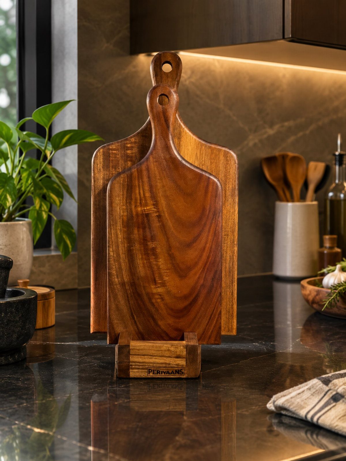 14 Kitchen Tabletop Decor Ideas to Style Your Counters 2 Layered wooden cutting boards standing in a holder on a dark marble kitchen counter