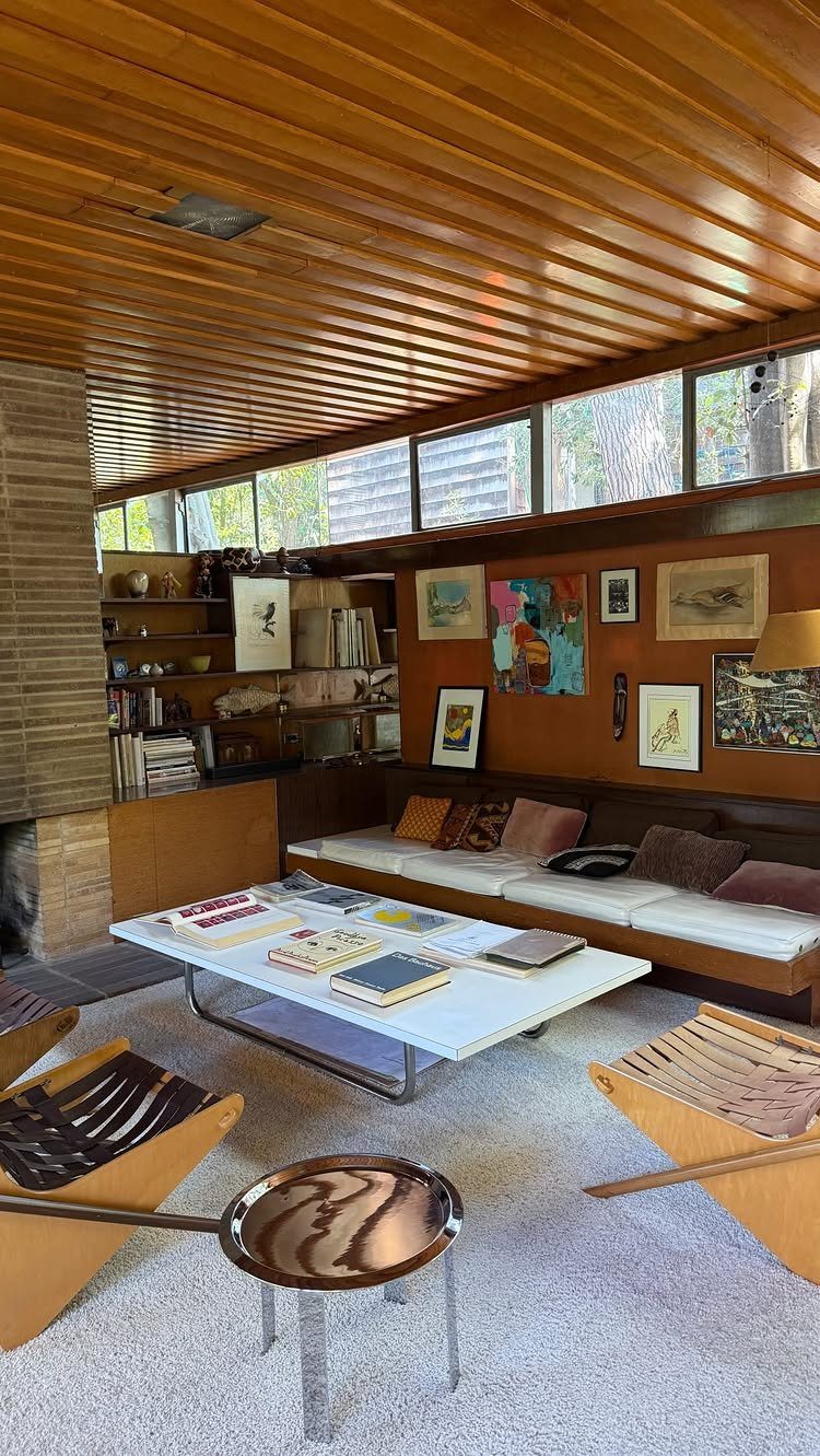 Mid Century Modern Items: 12 Ideas for Your Home 7 Mid-century modern living room with wood-slat ceiling, white furniture, and high clerestory windows.
