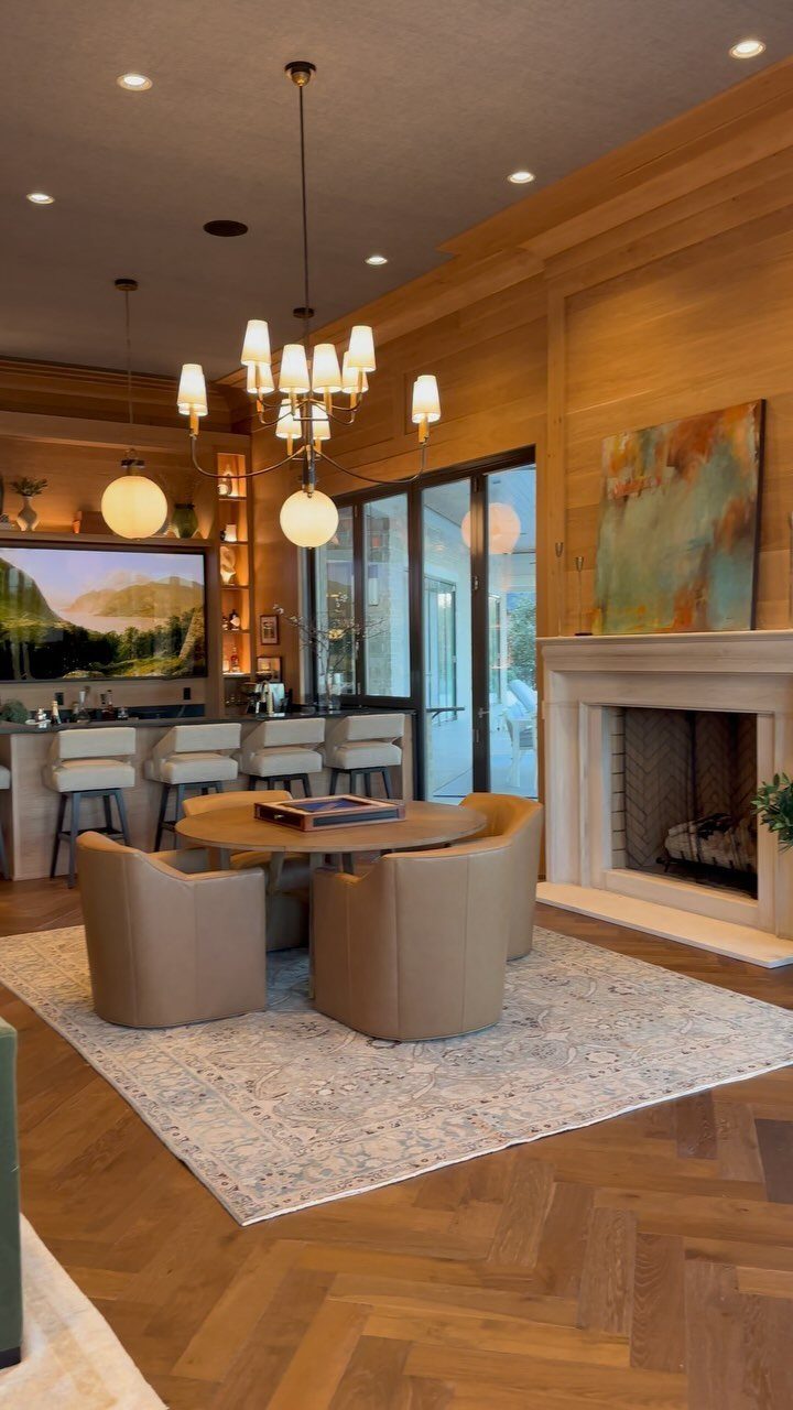 Oak Living Room Ideas: 9 Looks for Floors, Beams, Trim 4 Light oak herringbone flooring in a modern living room with tan leather chairs.