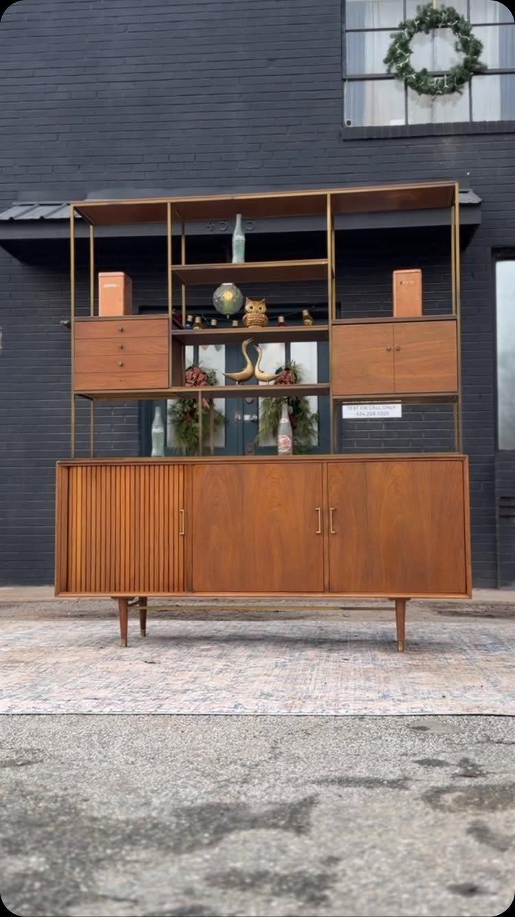 Mid-century modern Danish credenza hutch with open shelving and slatted cabinet doors.