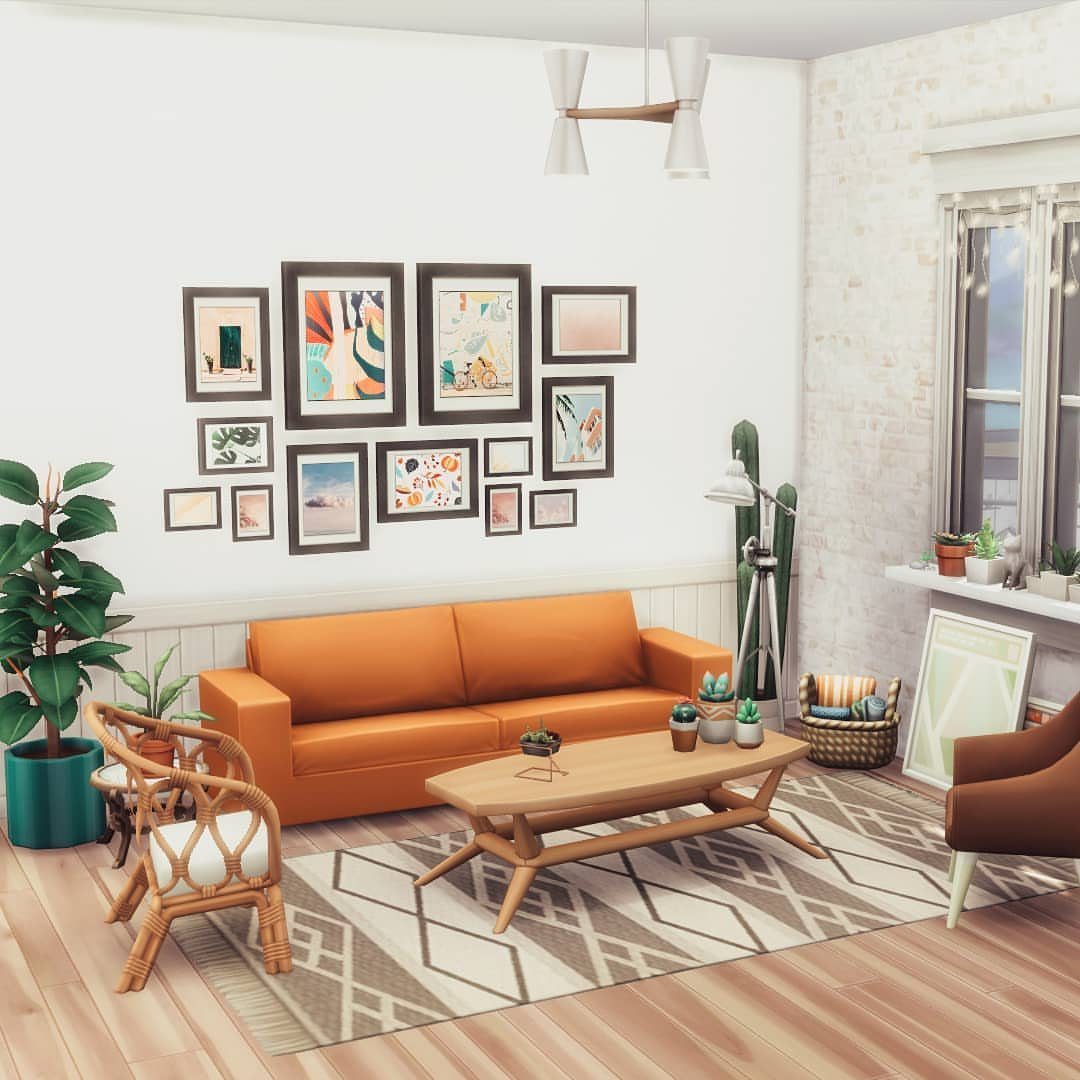 Sims 4 Living Room Ideas No CC: 5 Stunning Designs to Try 3 Orange sofa and wooden coffee table in a bright room with gallery wall art.