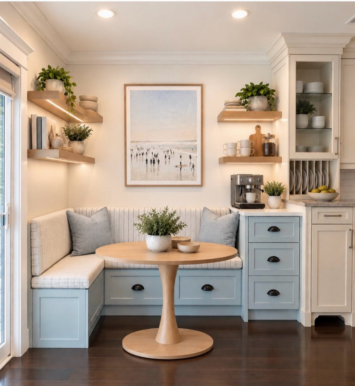 Tiny House Layout Ideas: 27 Smart Ways to Maximize Space 16 Built-in L-shaped banquette seating with a round wooden table in a bright kitchen.