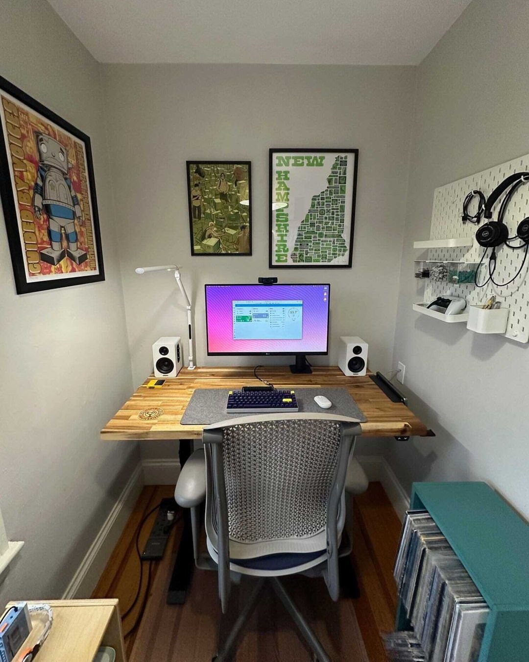 Tiny House Layout Ideas: 27 Smart Ways to Maximize Space 14 Small home office nook with a wooden desk, computer, and grey mesh chair.