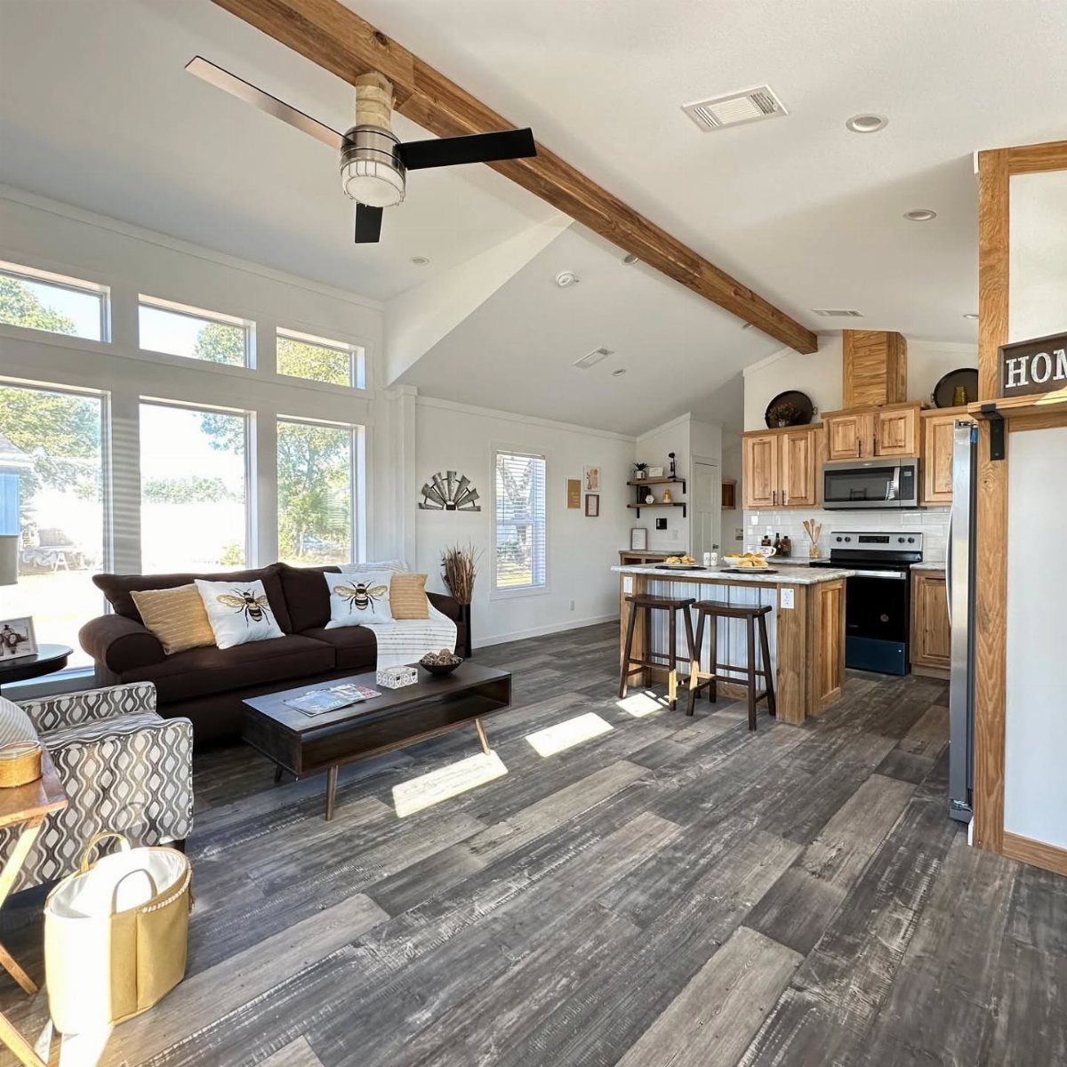 Tiny House Layout Ideas: 27 Smart Ways to Maximize Space 6 Tiny home interior with open living area and kitchen on a single level.