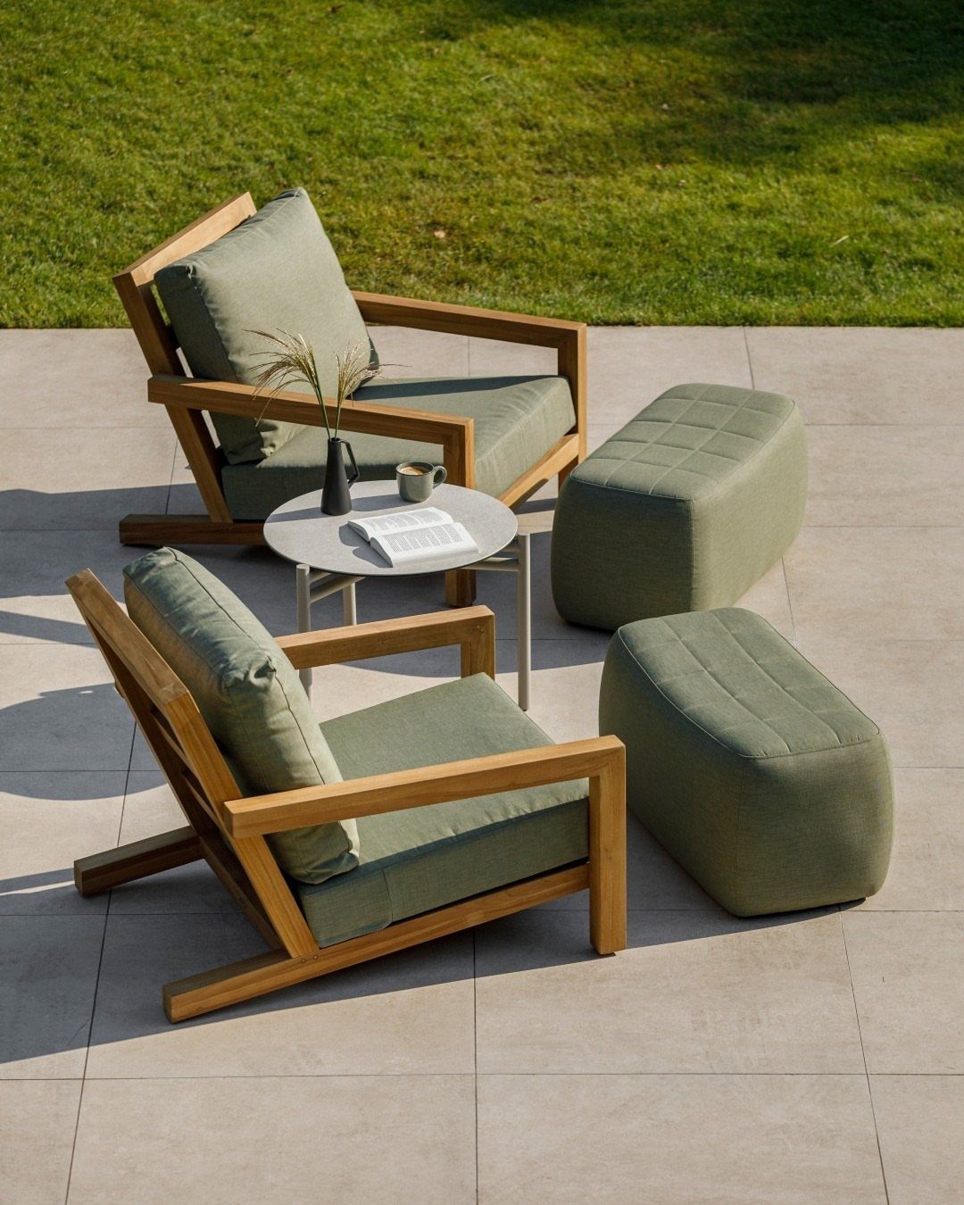 Wood Lounge Chair Ideas: 28 Styles from Teak to Mid-Century 28 Two wood lounge chairs with olive green cushions and matching ottomans on a patio.