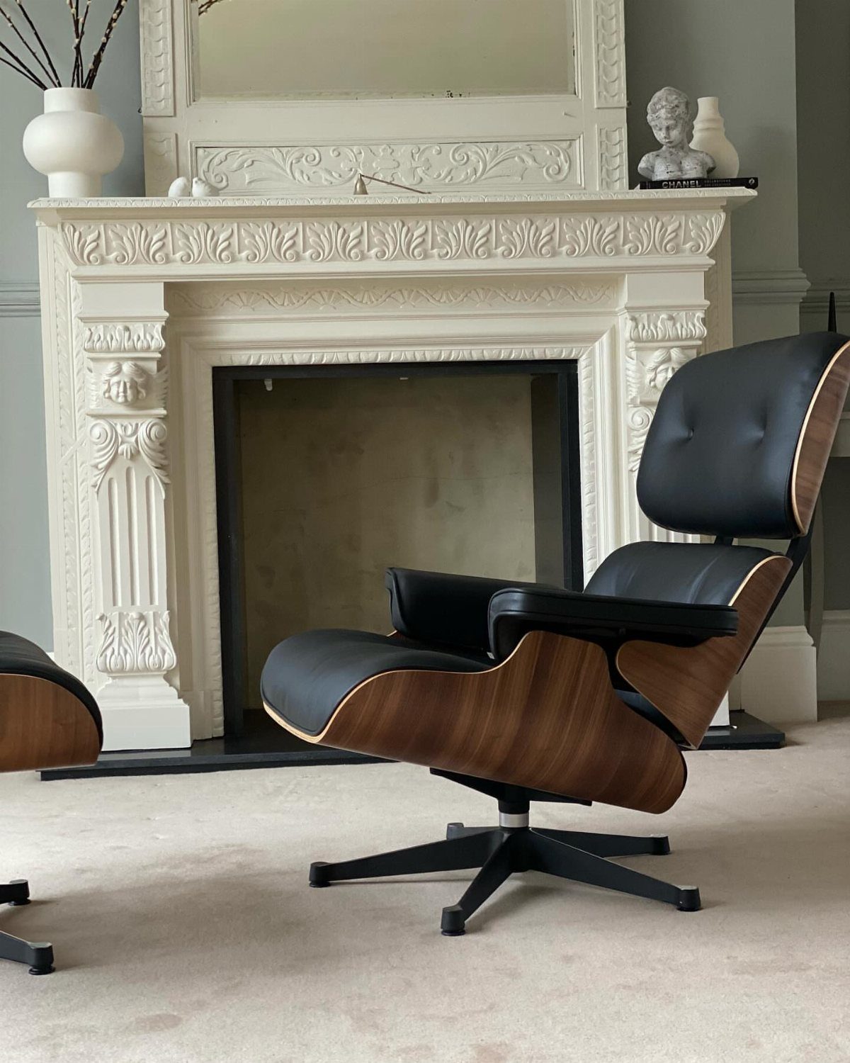 Wood Lounge Chair Ideas: 28 Styles from Teak to Mid-Century 12 Mid-century modern walnut and black leather lounge chair on a black swivel base.
