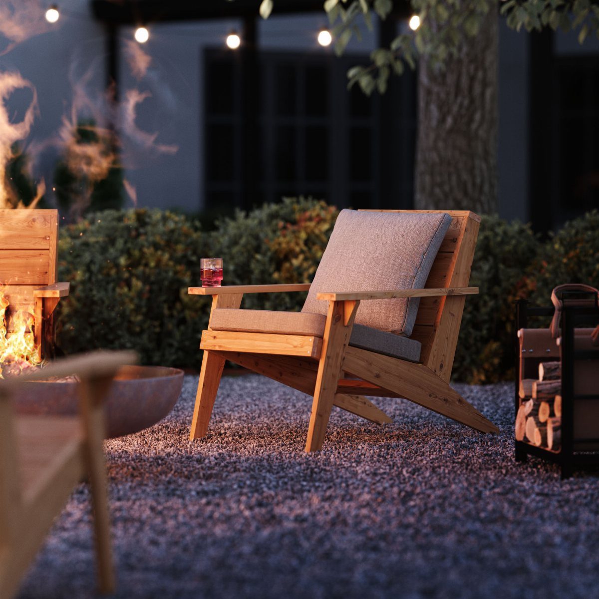 Wood Lounge Chair Ideas: 28 Styles from Teak to Mid-Century 7 Wood Adirondack chair with gray cushions on a gravel patio near a fire pit.