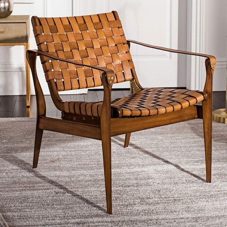 Wood Lounge Chair Ideas: 28 Styles from Teak to Mid-Century 25 Mid-century modern wood lounge chair with woven tan leather straps on a gray rug.
